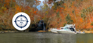 boats anchored at a waterfall